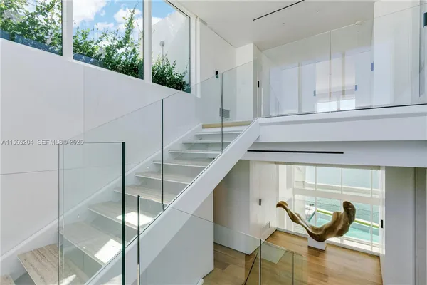 a backyard of a house with outdoor seating and green space