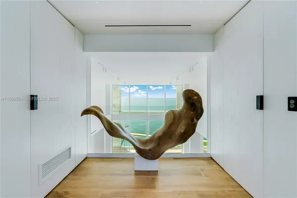 a view of a dining room with furniture and window