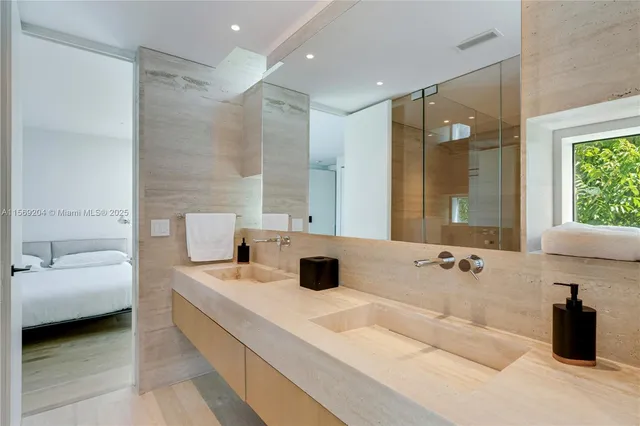 a view of a workspace with furniture and a workspace