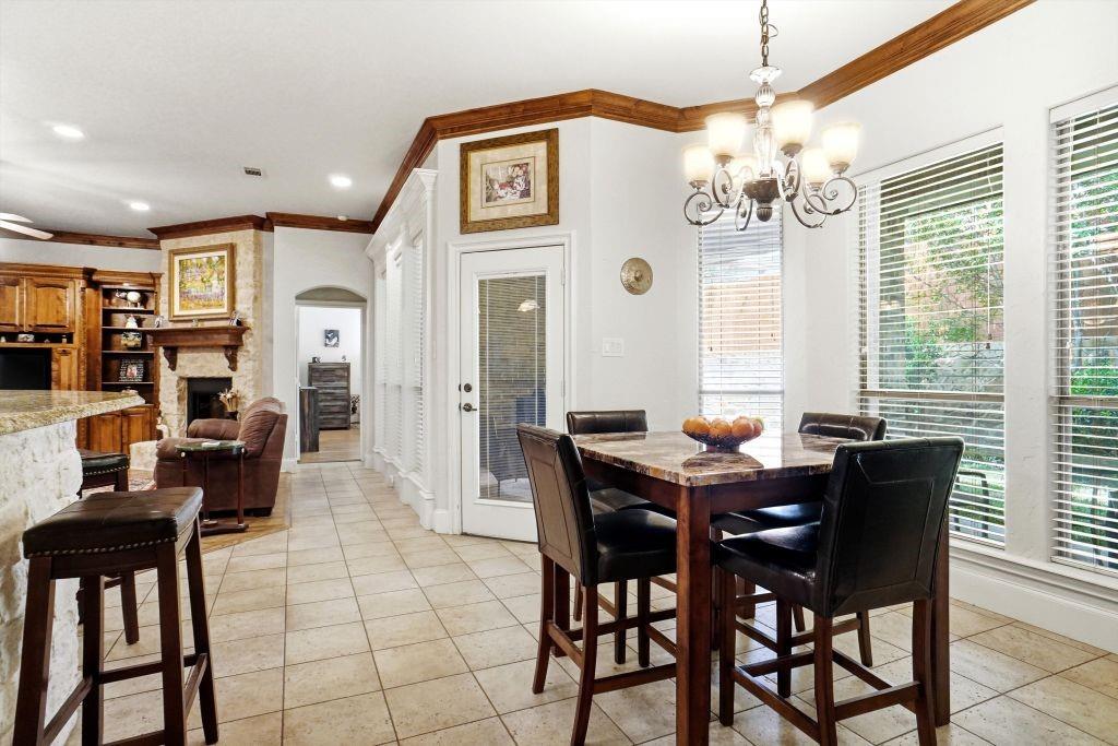 620 Highview Lane Hurst, TX 76054 - Photo 19 of 40 a view of a dining room with furniture window and outside view
