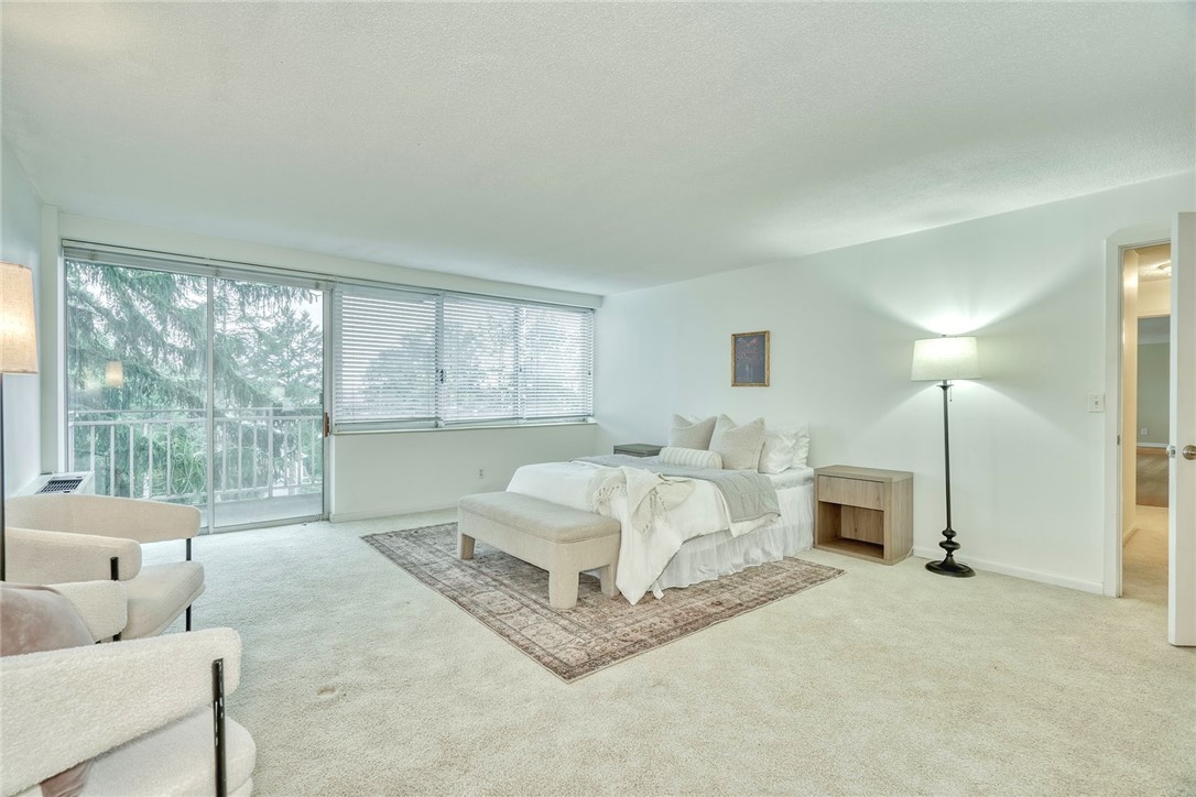 1400 East Avenue, Unit UN412 Rochester, NY 14610 - Photo 11 of 40 Beautiful and spacious primary bedroom featuring a