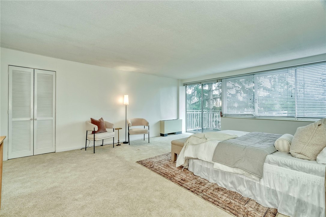 1400 East Avenue, Unit UN412 Rochester, NY 14610 - Photo 12 of 40 Entry view to primary bedroom and spacious two-doo