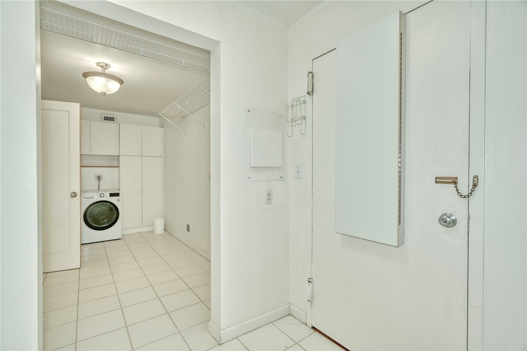 1400 East Avenue, Unit UN412 Rochester, NY 14610 - Photo 16 of 40 In-unit laundry machines and built-in cabinetry