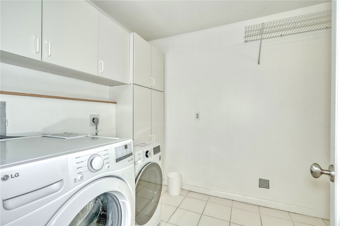 1400 East Avenue, Unit UN412 Rochester, NY 14610 - Photo 17 of 40 In-unit laundry machines paired with built-in stor