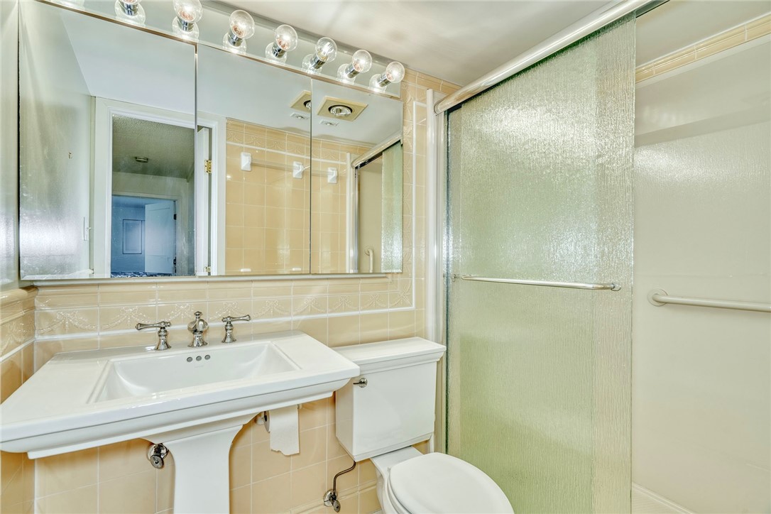 1400 East Avenue, Unit UN412 Rochester, NY 14610 - Photo 19 of 40 Bathroom near two bedrooms with spacious tub and s