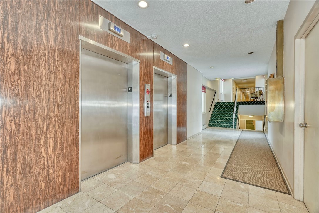 1400 East Avenue, Unit UN412 Rochester, NY 14610 - Photo 32 of 40 Elevators located at the first floor entrance area