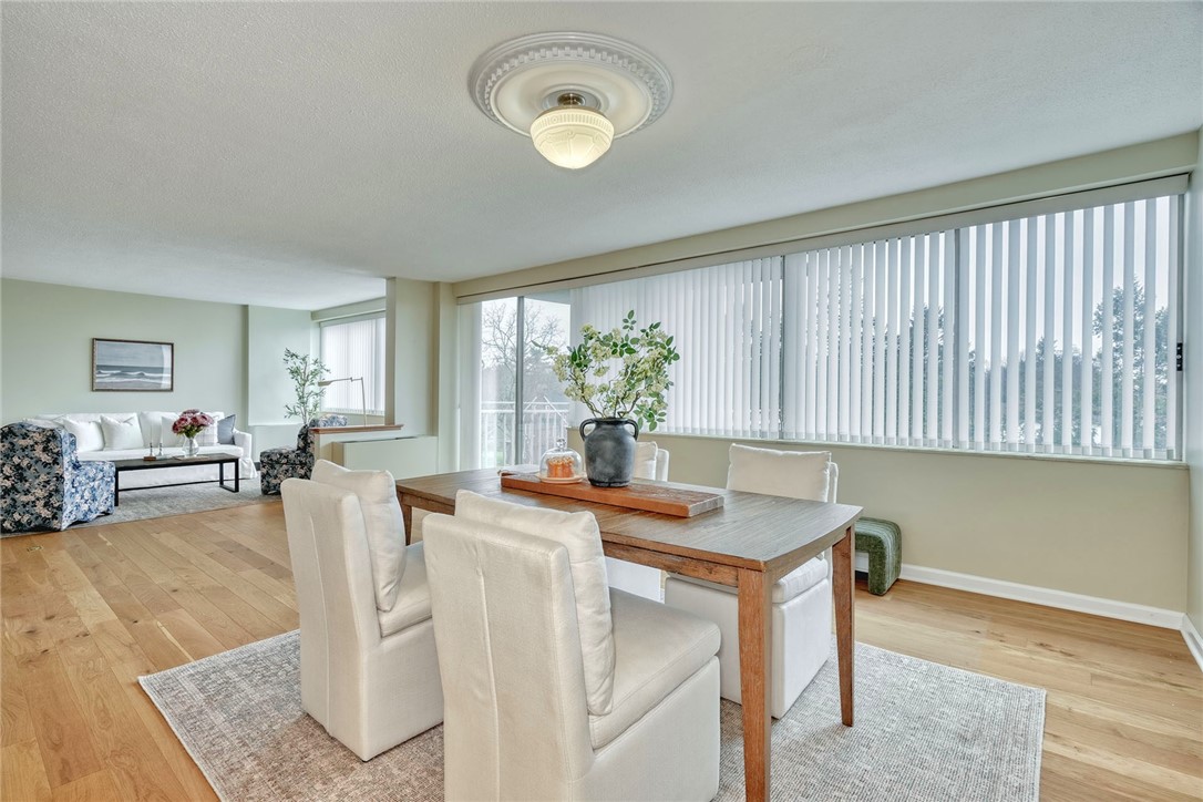 1400 East Avenue, Unit UN412 Rochester, NY 14610 - Photo 7 of 40 View from the kitchen overlooking the dining and l
