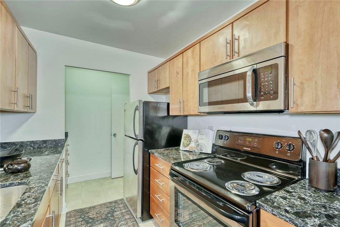 1400 East Avenue, Unit UN412 Rochester, NY 14610 - Photo 9 of 40 Alternate view of the kitchen, highlighting its bu