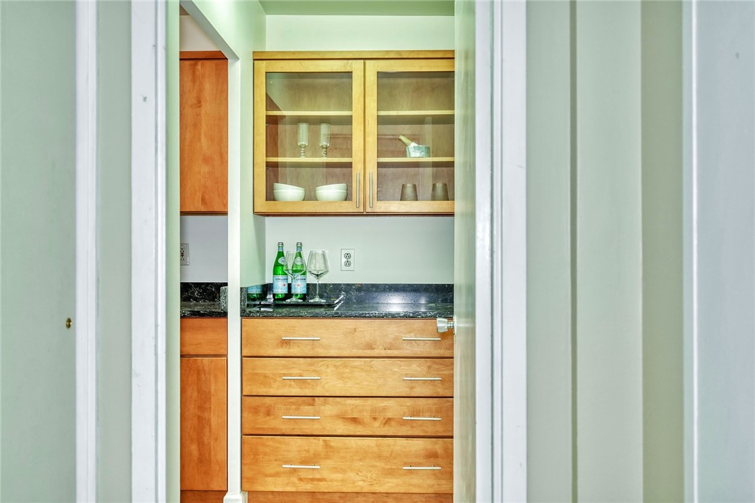 1400 East Avenue, Unit UN412 Rochester, NY 14610 - Photo 10 of 40 Custom built-in cabinetry designed for both entert