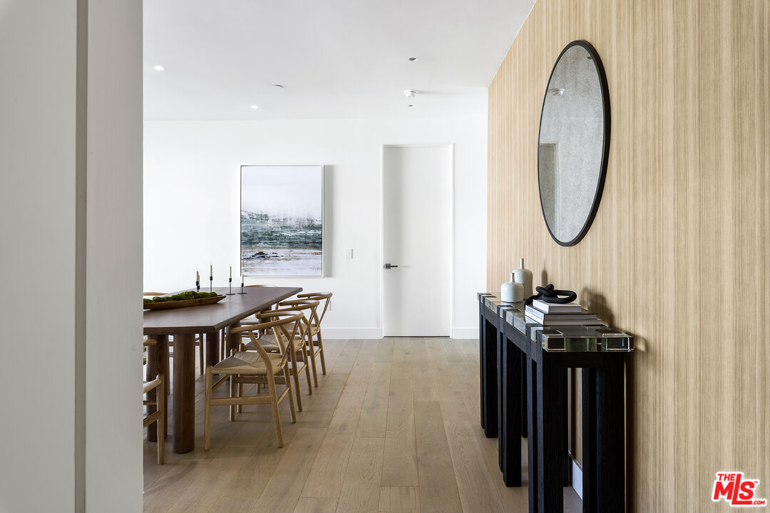 1644 Malcolm Avenue, Unit 420 Los Angeles, CA 90024 - Photo 11 of 64 a view of a room with furniture and wooden floor