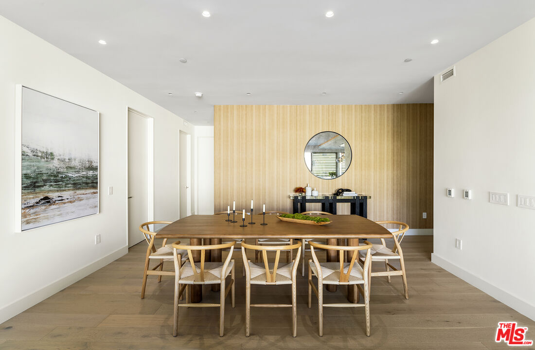 1644 Malcolm Avenue, Unit 420 Los Angeles, CA 90024 - Photo 18 of 64 a view of a dining room with furniture window and wooden floor