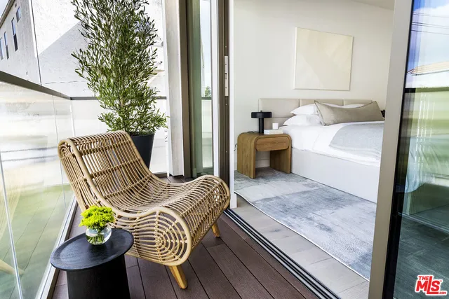 a bathroom with a double vanity sink and mirror