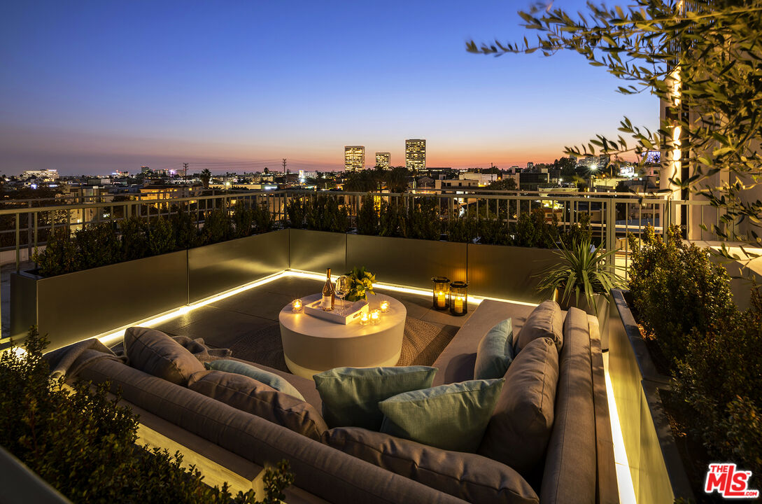 1644 Malcolm Avenue, Unit 420 Los Angeles, CA 90024 - Photo 59 of 64 a view of a balcony with furniture