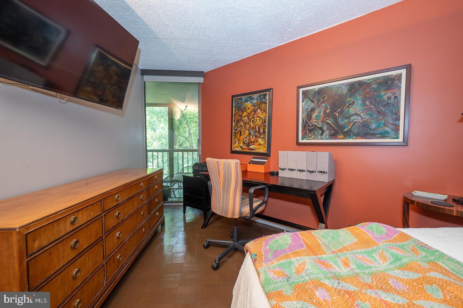 19 Rock Hill Road, Unit 1F Bala Cynwyd, PA 19004 - Photo 19 of 35 a bedroom with furniture and a window
