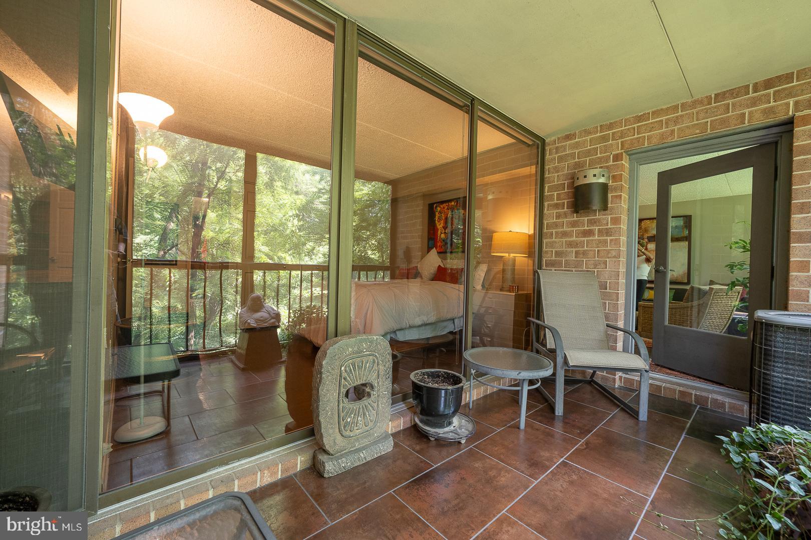 19 Rock Hill Road, Unit 1F Bala Cynwyd, PA 19004 - Photo 25 of 35 a room with gym equipment and large glass window