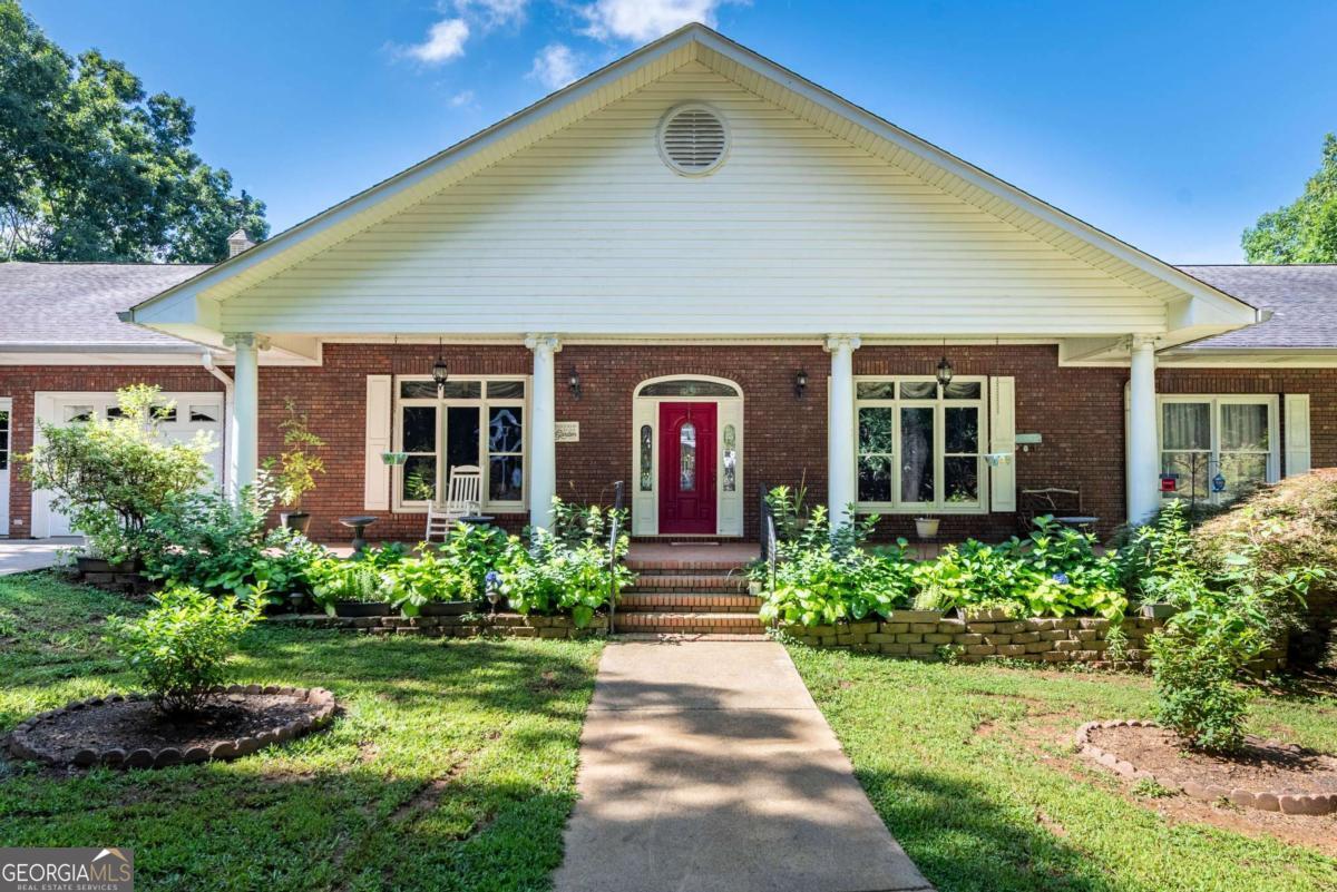 755 Harris Road Jasper, GA 30143 - Photo 18 of 62 a front view of a house with a yard
