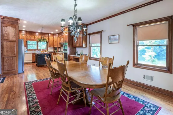 a room with furniture and a large window