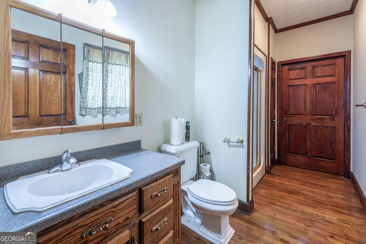 755 Harris Road Jasper, GA 30143 - Photo 39 of 62 a bathroom with a sink a toilet and shower