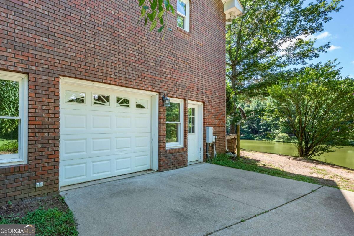 755 Harris Road Jasper, GA 30143 - Photo 49 of 62 a front view of a house with a yard
