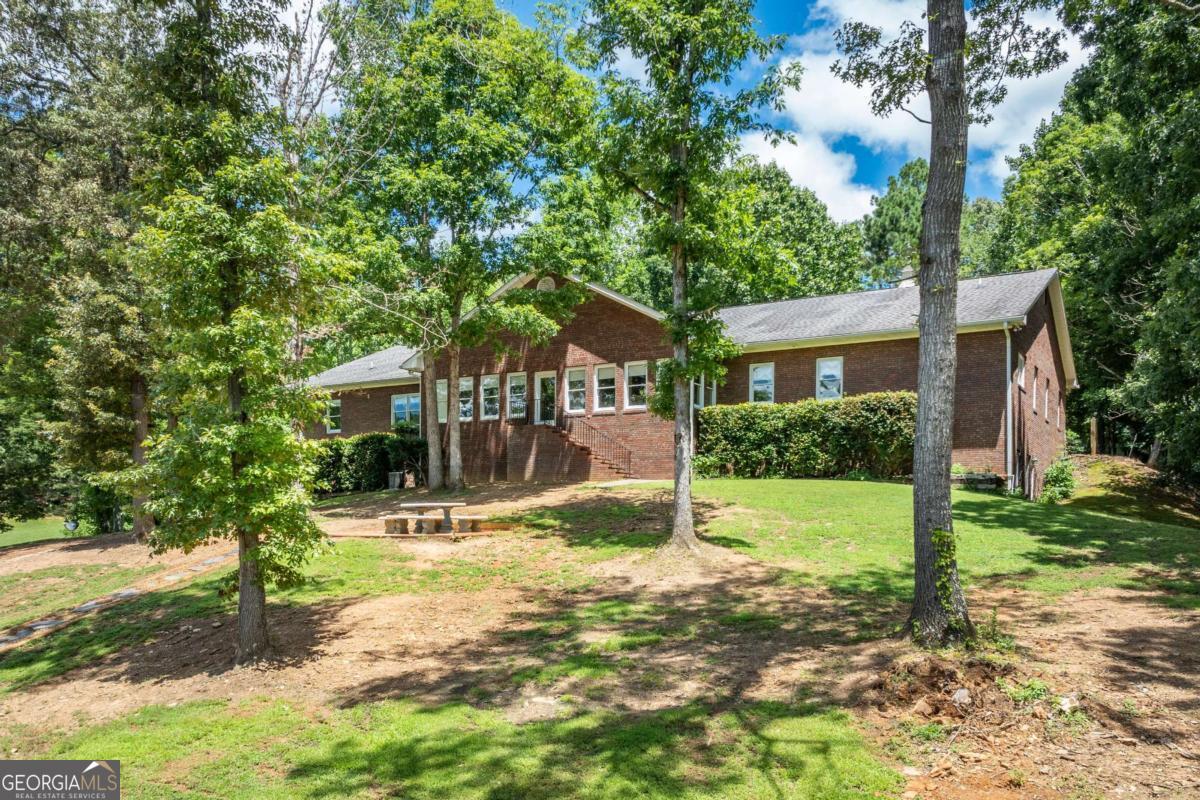 755 Harris Road Jasper, GA 30143 - Photo 58 of 62 a front view of a house with a yard