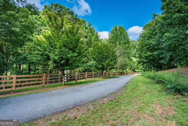 a view of a yard with an trees