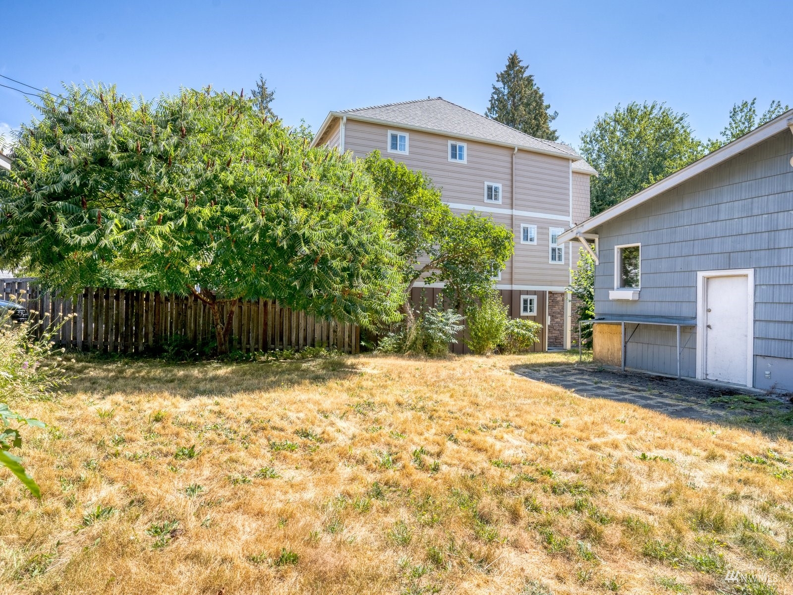 10120 Northeast 185th Street Bothell, WA 98011 - Photo 12 of 20 a front view of a house with a yard