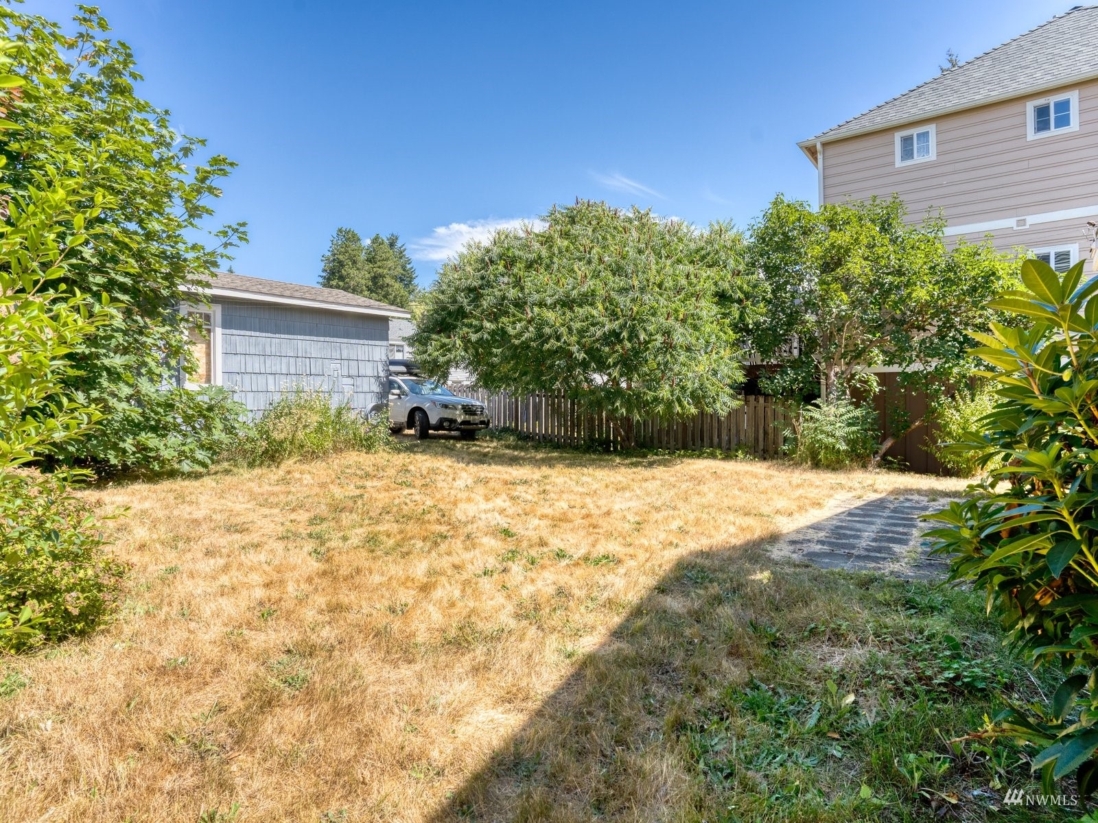 10120 Northeast 185th Street Bothell, WA 98011 - Photo 16 of 20 a view of a backyard of the house