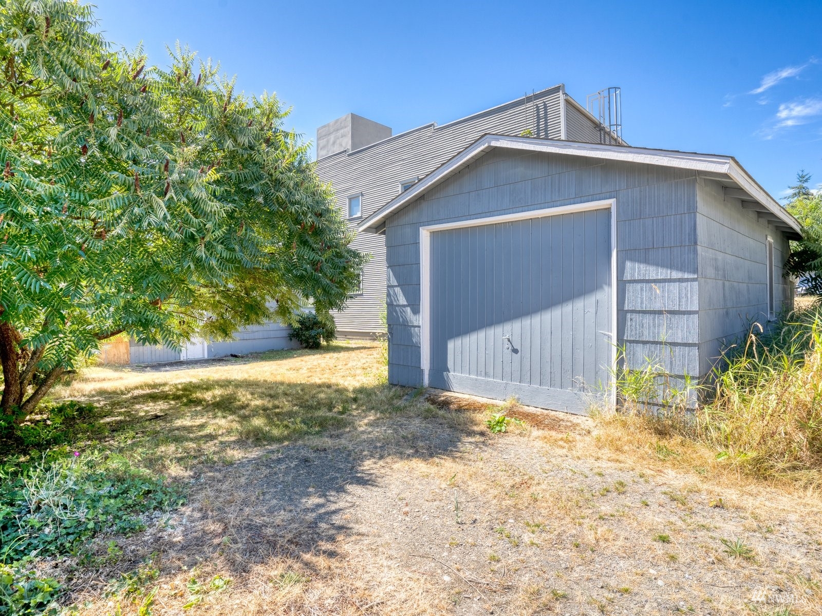10120 Northeast 185th Street Bothell, WA 98011 - Photo 20 of 20 a house with trees in the background