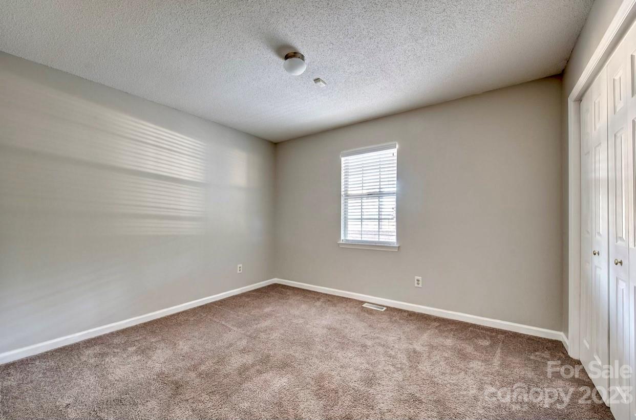 363 Griggs Road Clover, SC 29710 - Photo 16 of 26 an empty room with a window