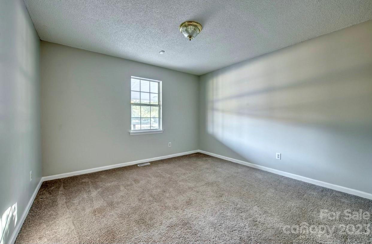 363 Griggs Road Clover, SC 29710 - Photo 17 of 26 an empty room with windows