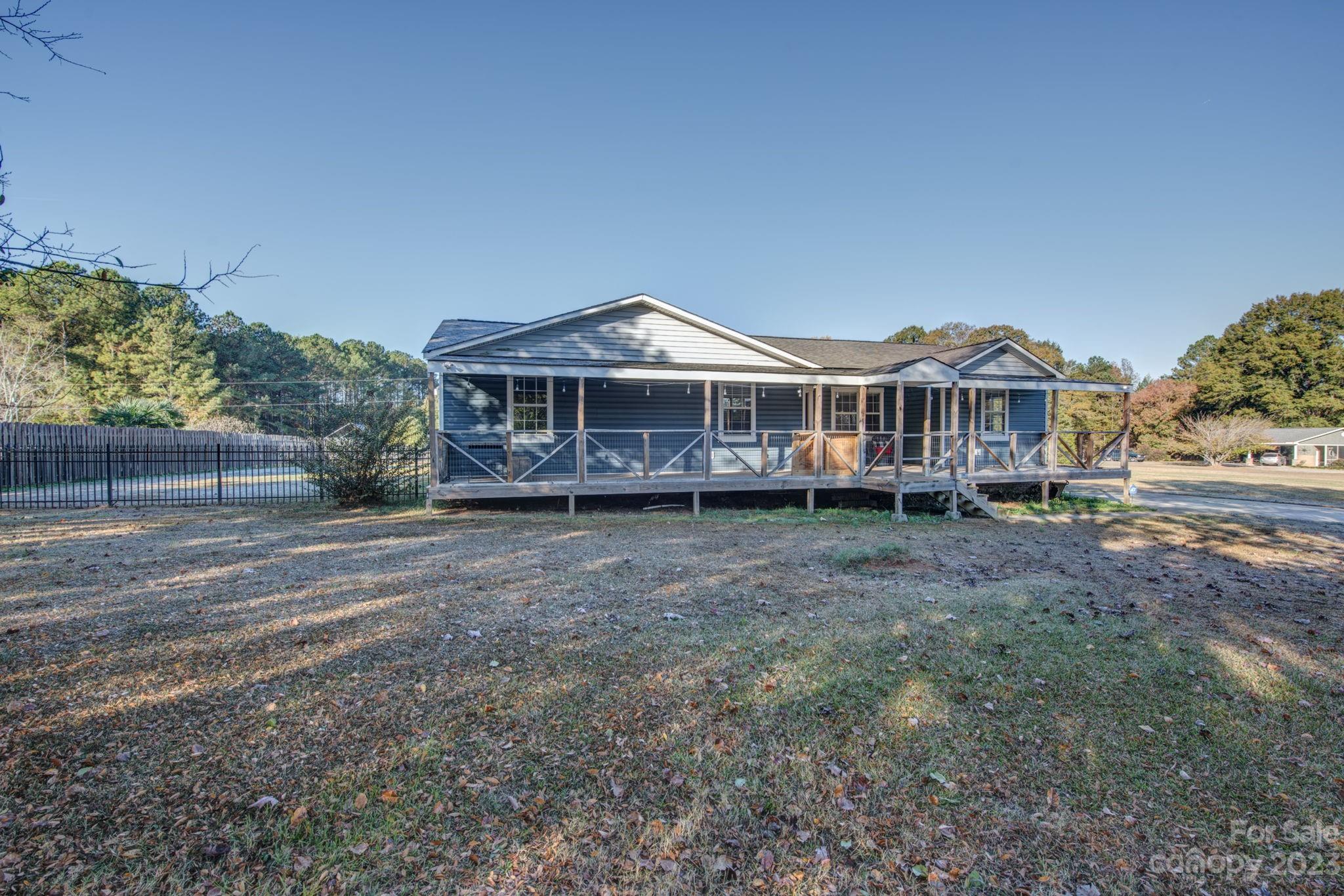 363 Griggs Road Clover, SC 29710 - Photo 25 of 26 a view of a house with a yard and sitting area