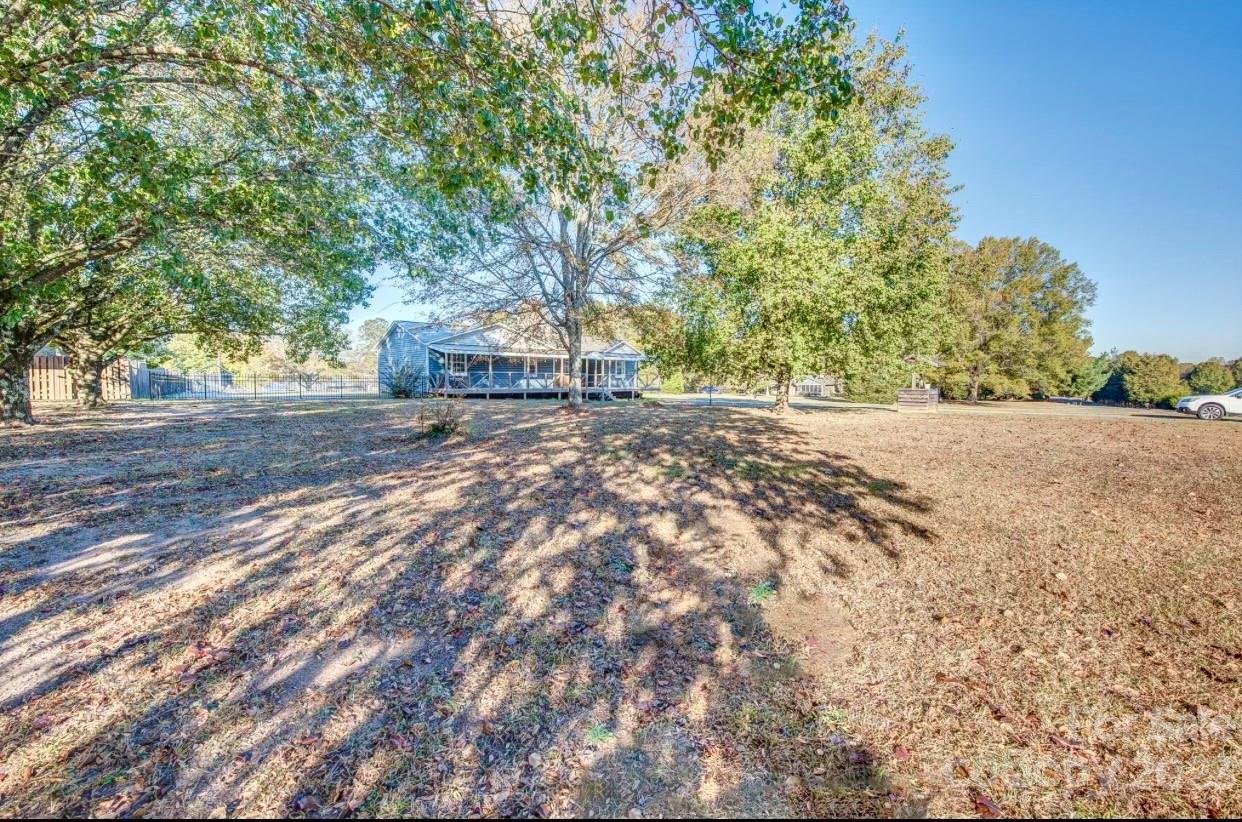363 Griggs Road Clover, SC 29710 - Photo 3 of 26 a view of a yard with large trees