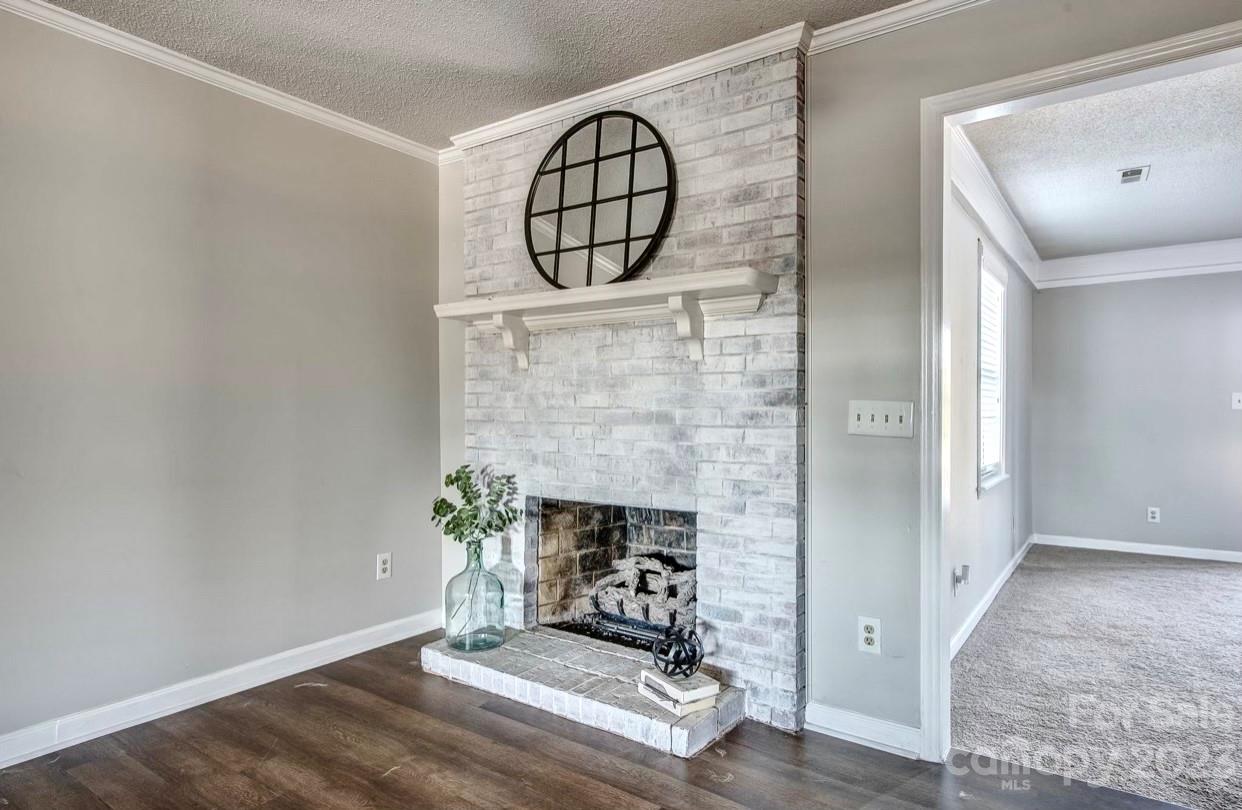 363 Griggs Road Clover, SC 29710 - Photo 9 of 26 a view of fireplace with wooden floor