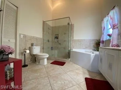 a bathroom with a bathtub and toilet