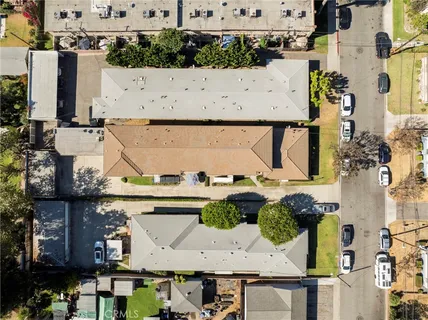 an aerial view of a house with outdoor space