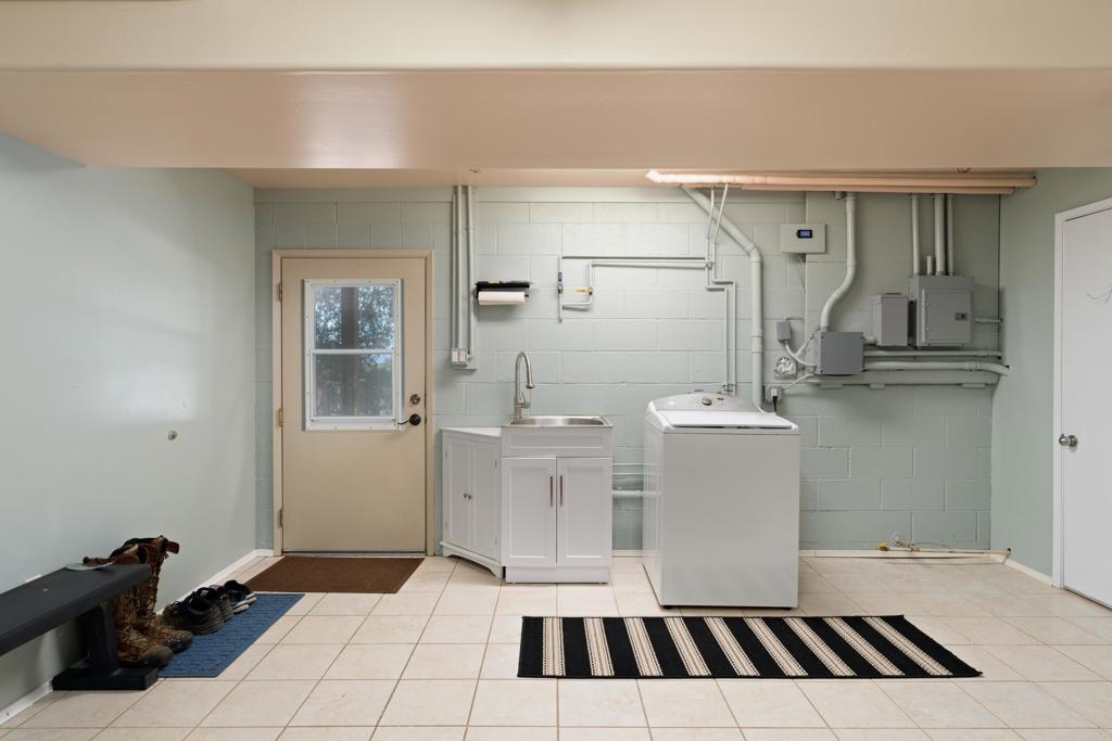 25770 East Grade Road Santa Ysabel, CA 92070 - Photo 31 of 75 a kitchen with a sink and cabinets