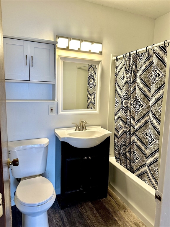 170 East Hadley Road, Unit 11 Amherst, MA 01002 - Photo 12 of 16 a bathroom with a sink a toilet and mirror