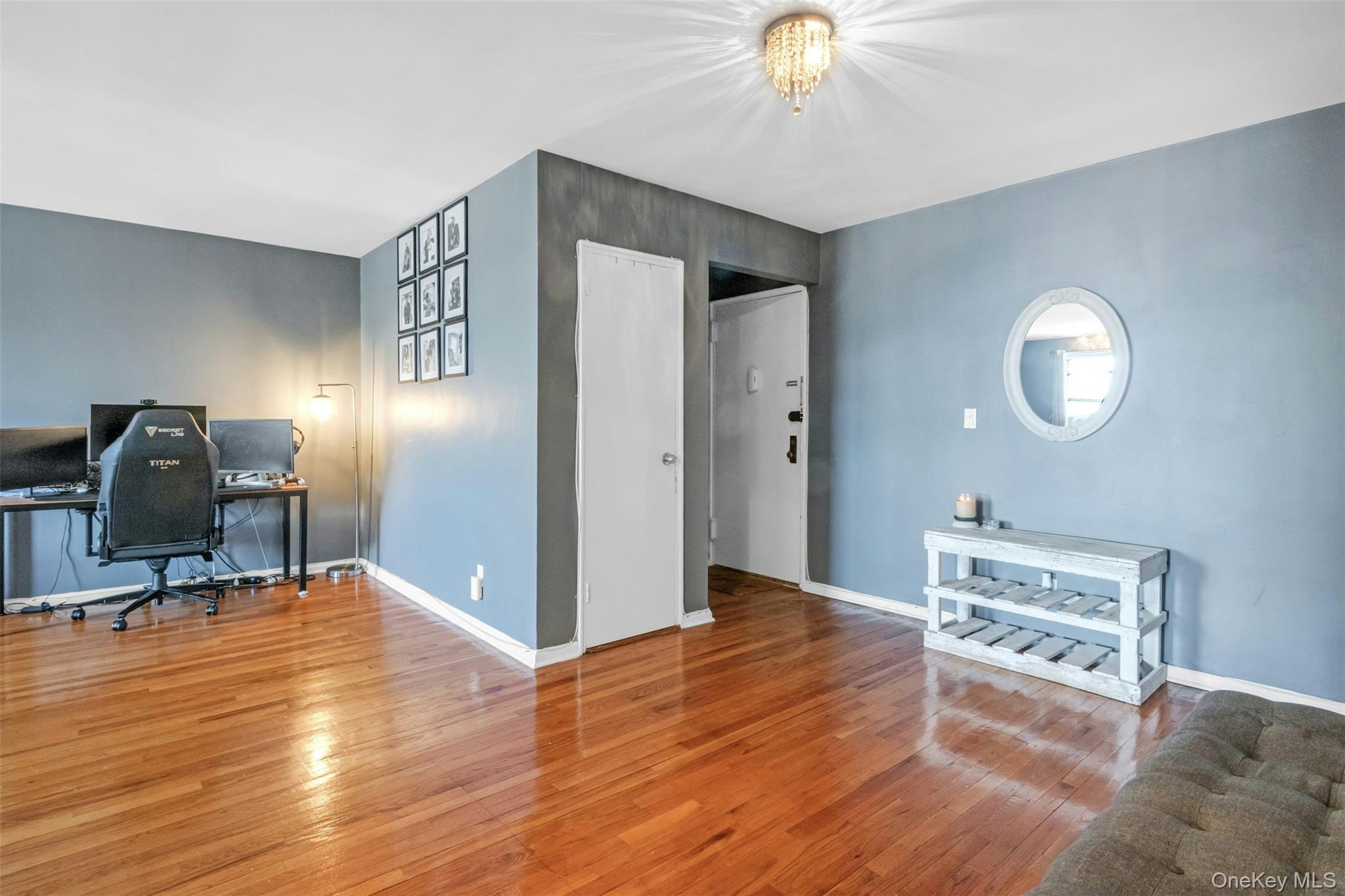 1234 Midland Avenue, Unit 5F Bronxville, NY 10708 - Photo 3 of 13 a view of a livingroom with a furniture and wooden floor