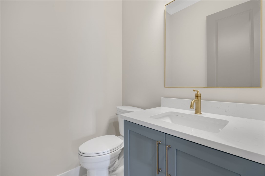 384 Jim Smith Road Pendleton, SC 29670 - Photo 12 of 48 Clean lines and a modern vanity define this elegant half bath.