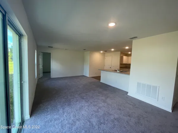 a view of a kitchen and a sink