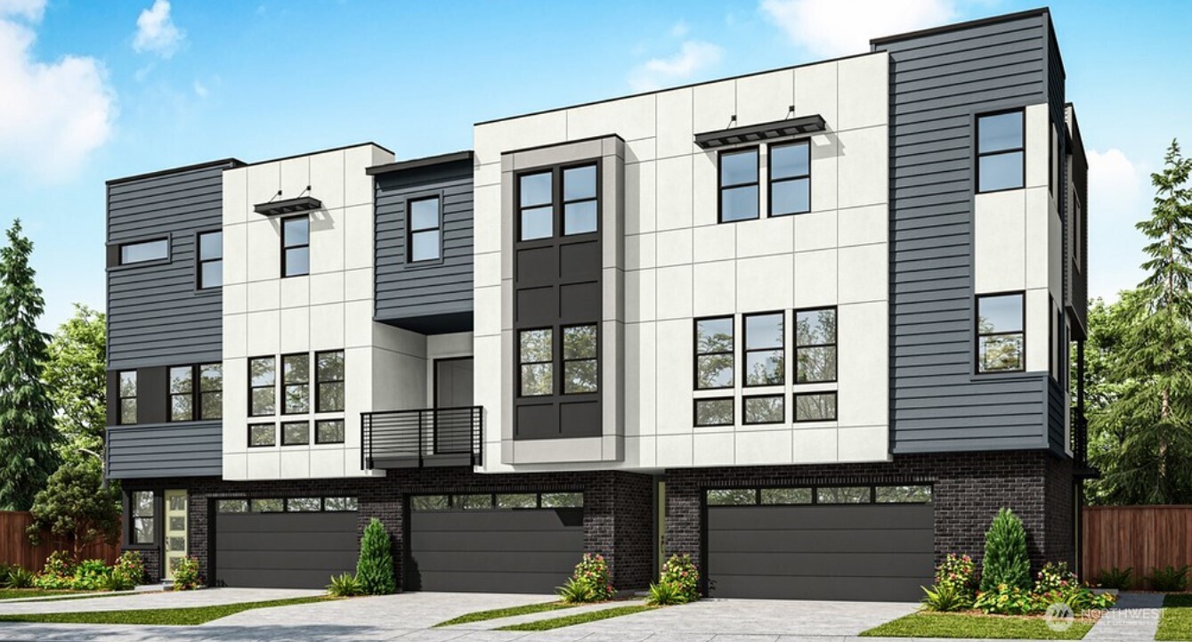 18808 99th Court Northeast, Unit B Bothell, WA 98011 - Photo 2 of 21 a front view of a building with a garden