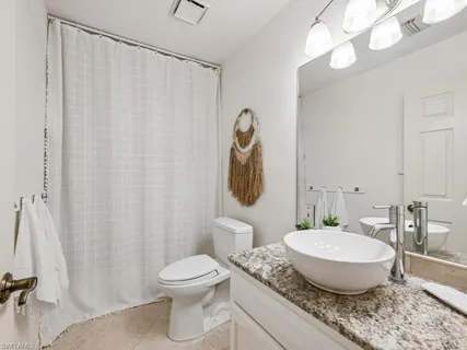 $919,000 | 601 97th Avenue North, Naples, FL 34108