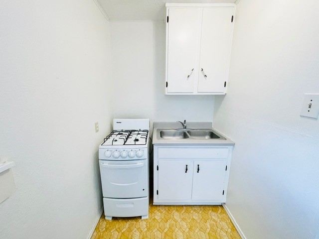4518 Nicholson Street Corpus Christi, TX 78415 - Photo 25 of 32 a room with a sink and cabinets