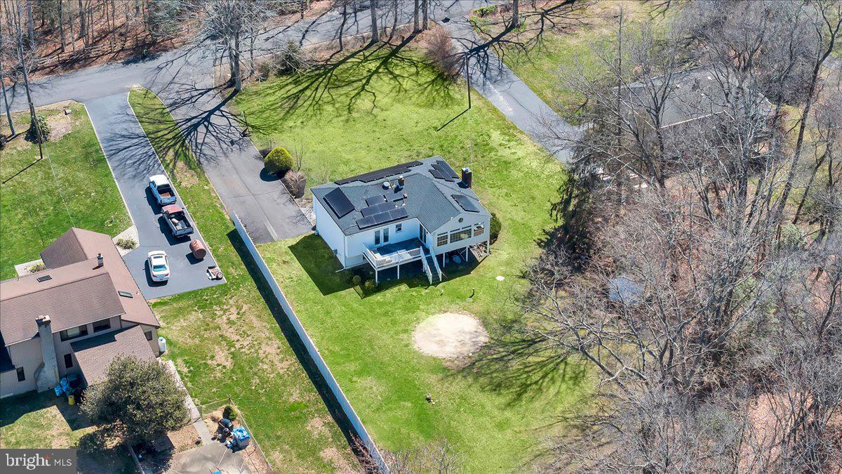 97 3 Bridge Road Shamong, NJ 08088 - Photo 41 of 45 an aerial view of a house with a yard and swimming pool