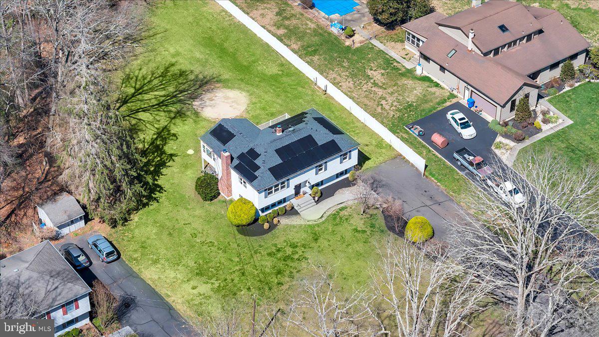 97 3 Bridge Road Shamong, NJ 08088 - Photo 42 of 45 an aerial view of a house with a swimming pool