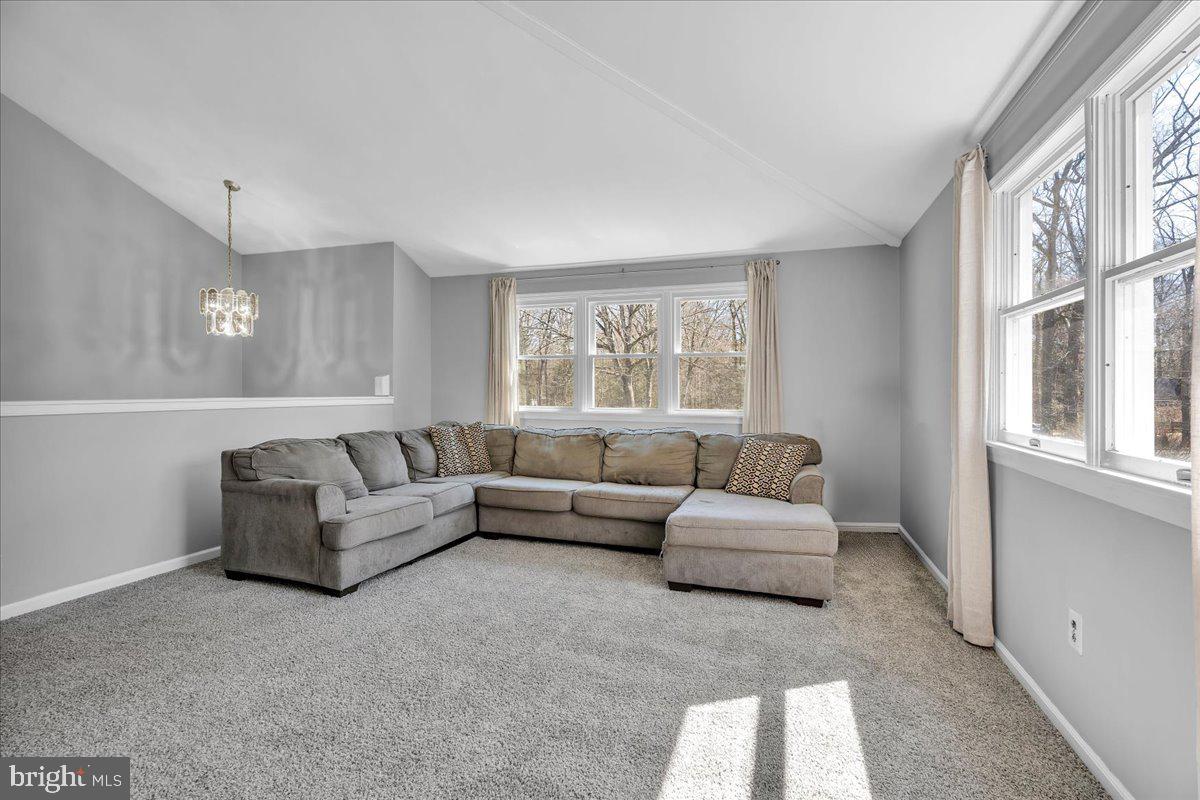97 3 Bridge Road Shamong, NJ 08088 - Photo 5 of 45 a living room with furniture and windows