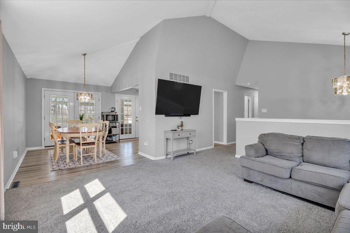 97 3 Bridge Road Shamong, NJ 08088 - Photo 8 of 45 a living room with furniture and a flat screen tv
