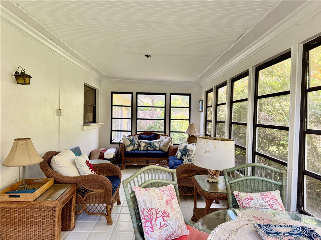 1946 Surfside Terrace Vero Beach, FL 32963 - Photo 33 of 36 a living room with furniture and a large window