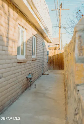 a bathroom with a sink vanity and mirror