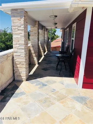 a kitchen with stainless steel appliances granite countertop a sink and a stove